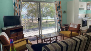 First floor unit close to shops, park and waterfront!